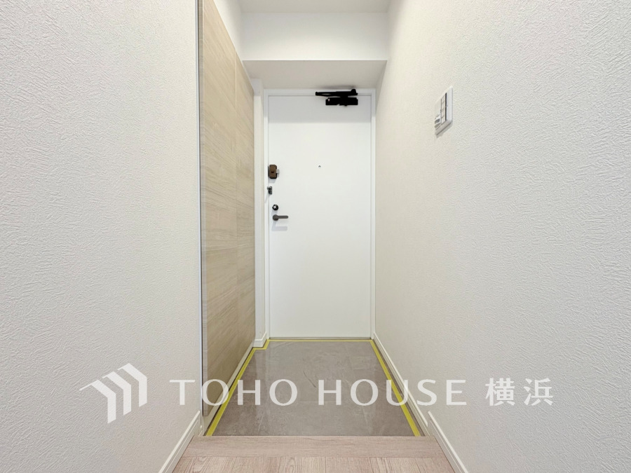 トールサイズのシューズボックスを設置した玄関スペース。
