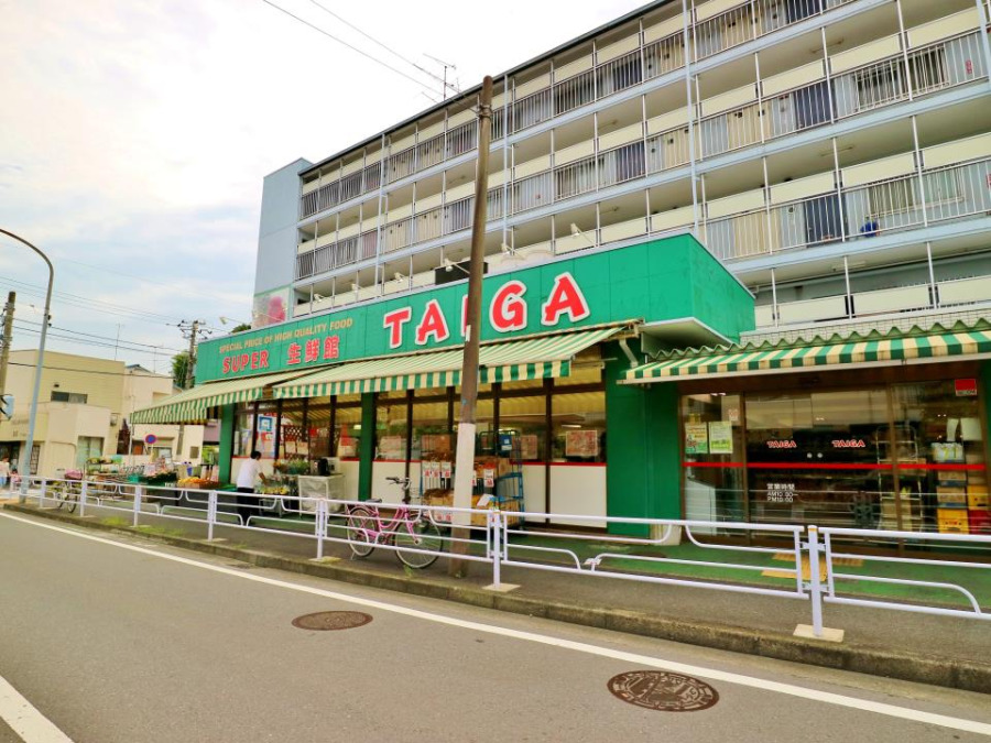 スーパTAIGA永田店(約1100ｍ。毎週日曜日に朝市を開催中。毎日の食卓に並ぶ食材が豊富に揃います。)